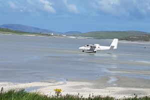 Plane landing on the beach